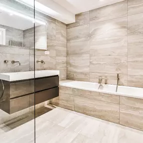 Revamp your bathroom with our custom tiled showers, expertly crafted to provide a spa-like experience right at home.