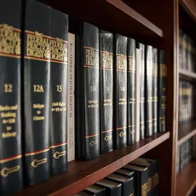 Bookshelf displaying copies of West's Federal Practice Digest