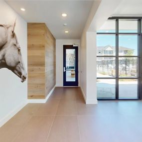 a horse mural on the wall of the spacious resident lounge