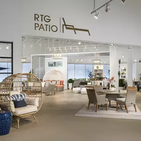 RTG Patio showroom entrance with stylish furniture displays.