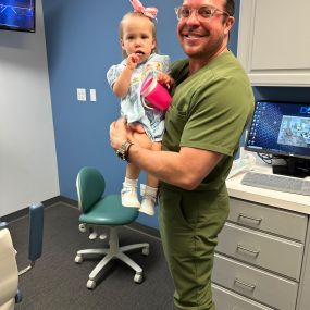 Dr. Beville with patient