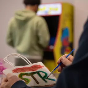 STR Behavioral Health Cedar Creek: Activity room at our wellness center building where art therapy can take place at our residential mental health treatment facility.