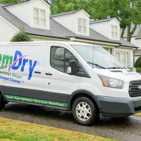 Chem-Dry van in a driveway the healthier, deeper carpet cleaner