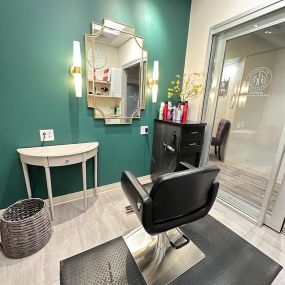 A chic and modern salon suite for rent in Denver, Co. Highlighting custom painted walls, one-of-a-kind mirrors and more.