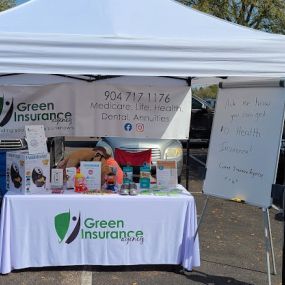 Green Insurance Agency Health Insurance Event Booth in Orange Park Florida