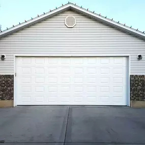 Garage door installation Roy Utah by Beacon Garage Doors, experts in repair and installation services.