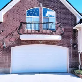 Long panel Amarr Lincoln 2000 garage door installed in Layton Utah by Beacon Garage Doors