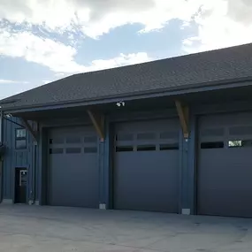 Commercial garage door installation and service in Farr West, Utah by Beacon Garage Doors.