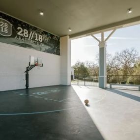 Covered outdoor basketball court.