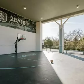 Covered outdoor basketball court.