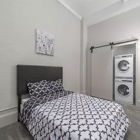 Bedroom with washer and dryer space