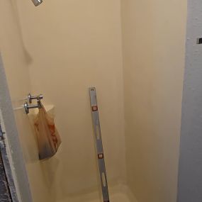A picture of a shower with tools in it