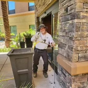 Termites are on the menu today.  Look at that super happy technician.  You wouldn't ever guess it's 110 outside.