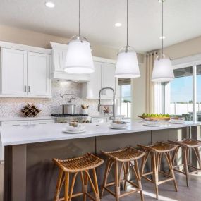 Spacious kitchen with abundant cabinets and countertops