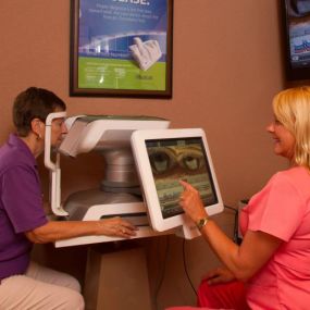 Staff examining a patient