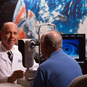 Dr. James E. Croley III examining a patient