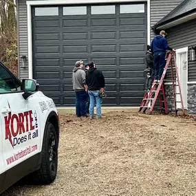 Korte Does It All, Inc. work van outside of the house