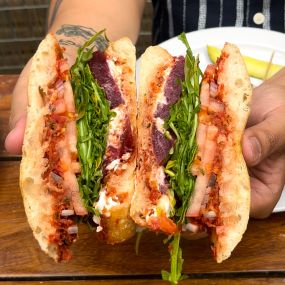 Sun-dried Tomato Pesto, Goat Cheese, Arugula, Red Onion & Tomatoes on Ciabatta