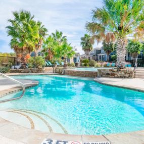 Resort-Style Swimming Pool with spacious sundeck.