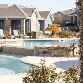 Resort-Style Swimming Pool with spacious sundeck.