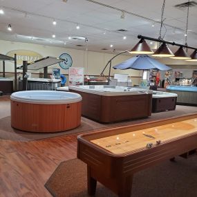 Phillips Lifestyles showroom showing hot tubs and shuffle board