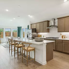 Dove Hollow Model Kitchen Photo by Trophy Signature Homes.