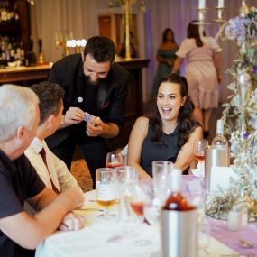 Jack Shields Professional Wedding Magician Amazes Bride and Groom at The Villa Wrea Green Wedding Breakfast In Lancashire and the North West of England Near Me Magical Entertainment Wedding Host Magic