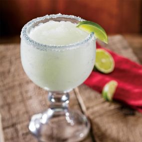 Texas Margarita: Made with gold tequila and fine liqueurs, served on-the-rocks or frozen.
