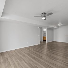Expansive living room with plank flooring