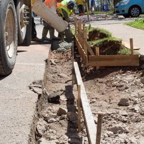 Dominion Paving Contractors Laying Concrete