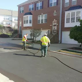 Dominion Paving Contractors laying new asphalt