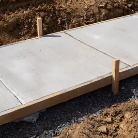 Concrete Curbing Services- Walkway being installed