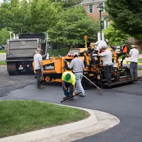 Dominion Paving Employees Laying New Asphalt