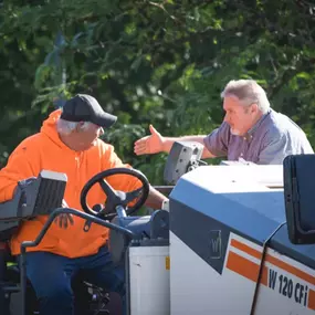 Dominion Paving Employees talking to one another