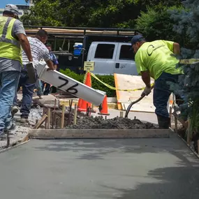 Dominion Paving Contractors pouring and laying concrete