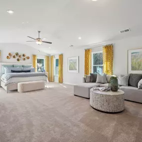 Spacious primary suite with sitting area