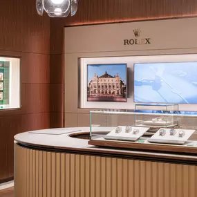 Our Rolex showroom features some of the most modern display vitrines on the market.  The walls are meticulously lined with wood and limestone tiles in which every grain is aligned seamlessly, creating the impression every wall is cut from a single block of wood.