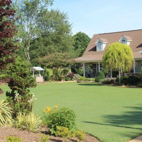 Mint Landscaping in Huntersville, NC can help you create a beautiful backyard, deck, patio or enhance your front entrance!