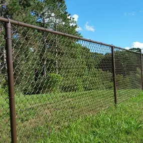 Galvanized Brown Vinyl Coated Chain Link fence.