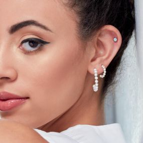 Pearl hoop earrings and gemstone stud earring