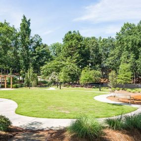 Outdoor area with walking trail and dog park.