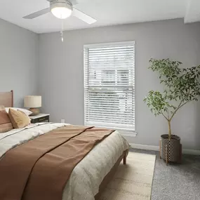 The bedrooms at Elliot Norcross Apartments provide a cozy and comfortable living space.