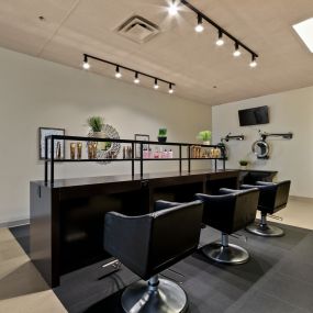 Our six color chairs, designed without mirrors, create a more intimate and personalized experience. Color services begin at our color bar, move to the lather lounge for shampooing, and finish in our salon.