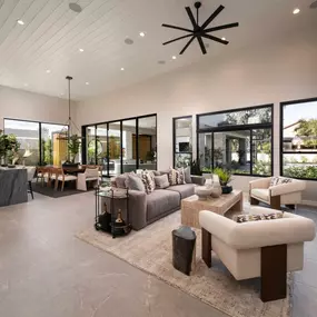 Expansive great room with ample natural lighting, bringing the outdoors in