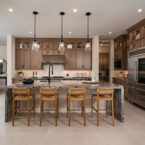 Stunning kitchens with large center islands and ample cabinet and counter space