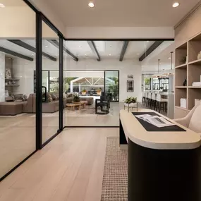 Gorgeous home office space with glass door enclosure
