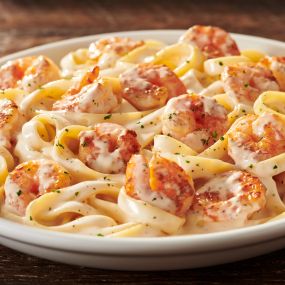 Shrimp Alfredo: Fettuccine alfredo tossed with sautéed shrimp.