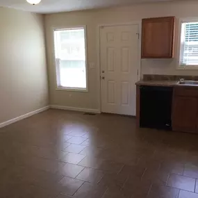 Kitchen with dishwasher and multiple windows