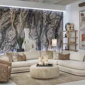 Luxurious living room display with marble-inspired accent wall.