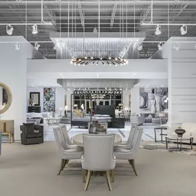 Elegant showroom layout with modern furniture and lighting.